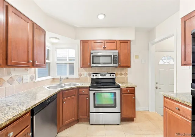 Photo 2 of Single family home for sale at 1945 Oakland St, Aurora, CO 80010 | MLS# 9348740 | Listing updated on 2026-10-08