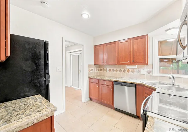 Photo 3 of Single family home for sale at 1945 Oakland St, Aurora, CO 80010 | MLS# 9348740 | Listing updated on 2026-10-08