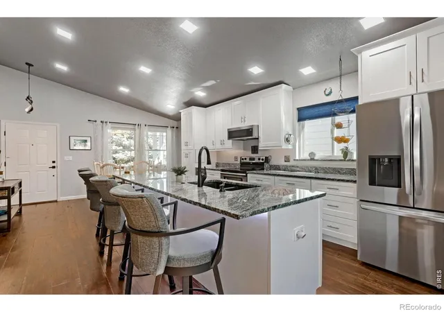 Photo 3 of Single family home for sale at 4033 W Kenyon Ave, Denver, CO 80236 | MLS# IR1069342 | Listing updated on 2026-10-05