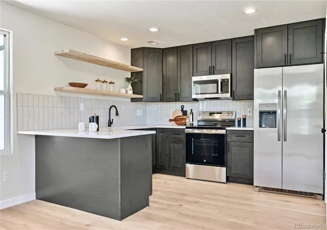 Photo 2 of Townhouse for sale at 7810 S Kittredge Cir, Englewood, CO 80112 | MLS# 9449435 | Listing updated on 2026-09-28