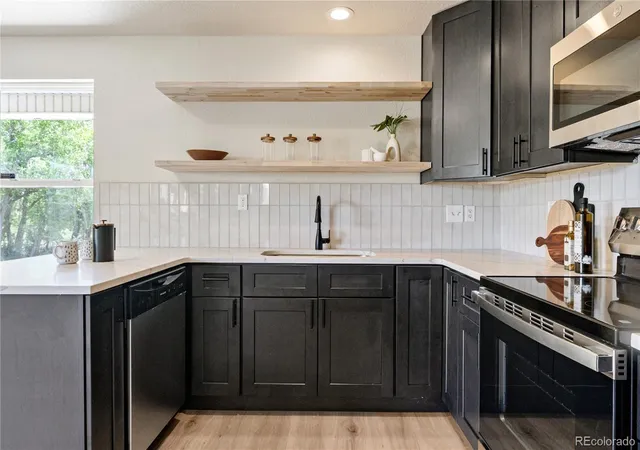 Photo 3 of Townhouse for sale at 7810 S Kittredge Cir, Englewood, CO 80112 | MLS# 9449435 | Listing updated on 2026-09-28