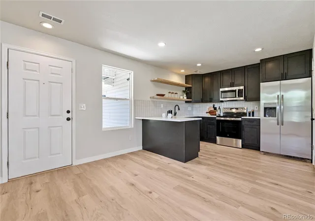 Photo 3 of Townhouse for sale at 7810 S Kittredge Cir, Englewood, CO 80112 | MLS# 9449435 | Listing updated on 2026-10-12