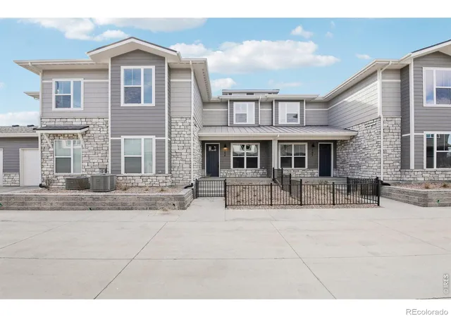 Photo 2 of Townhouse for sale at 410 High Point Dr #104, Longmont, CO 80504 | MLS# IR1069362 | Listing updated on 2026-09-25