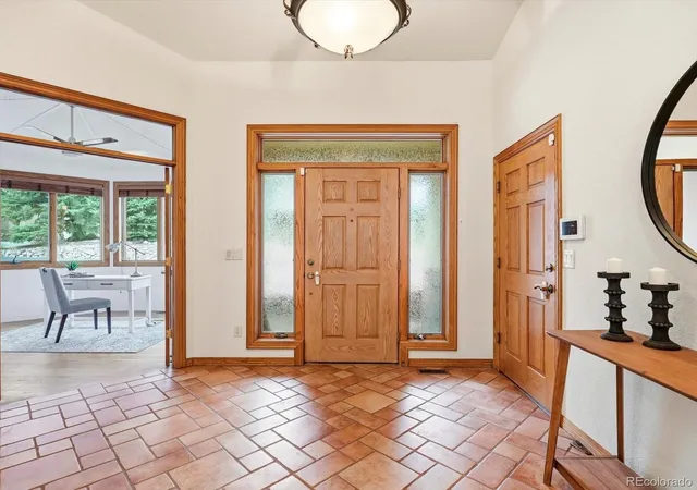Photo 3 of Single family home for sale at 7144 Fox Paw Trl, Littleton, CO 80125 | MLS# 5284909 | Listing updated on 2026-10-04