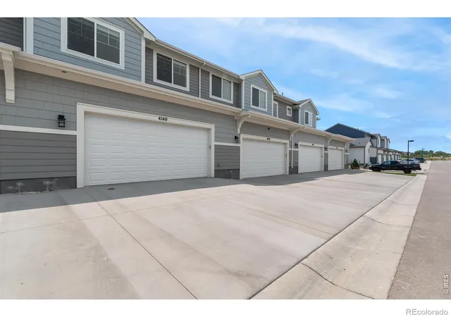 Photo 1 of Townhouse for sale at 4232 Trapper Lake Dr, Loveland, CO 80538 | MLS# IR1069369 | Listing updated on 2026-09-28