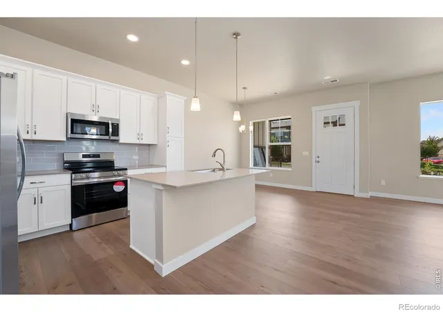 Photo 2 of Townhouse for sale at 420 High Point Dr #104, Longmont, CO 80504 | MLS# IR1069370 | Listing updated on 2026-10-07