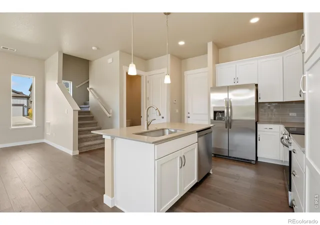 Photo 3 of Townhouse for sale at 420 High Point Dr #104, Longmont, CO 80504 | MLS# IR1069370 | Listing updated on 2026-10-07
