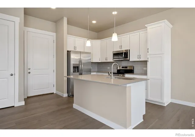 Photo 1 of Townhouse for sale at 420 High Point Dr #104, Longmont, CO 80504 | MLS# IR1069370 | Listing updated on 2026-10-07
