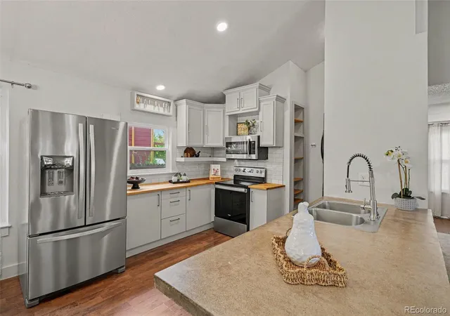 Photo 3 of Single family home for sale at 9647 W Elmhurst Pl, Littleton, CO 80128 | MLS# 1782846 | Listing updated on 2026-10-03