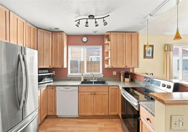 Photo 3 of Townhouse for sale at 12935 W 64th Drive #A, Arvada, CO 80004 | MLS# 8291687 | Listing updated on 2026-09-25