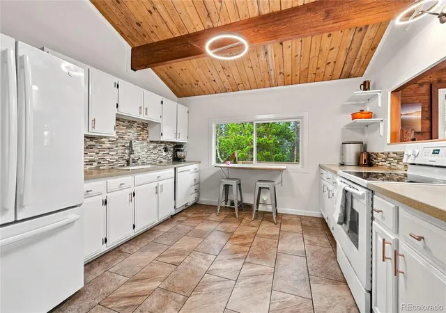 Photo 4 of Single family home for sale at 889 Lodgepole Dr, Evergreen, CO 80439 | MLS# 3971061 | Listing updated on 2026-10-02