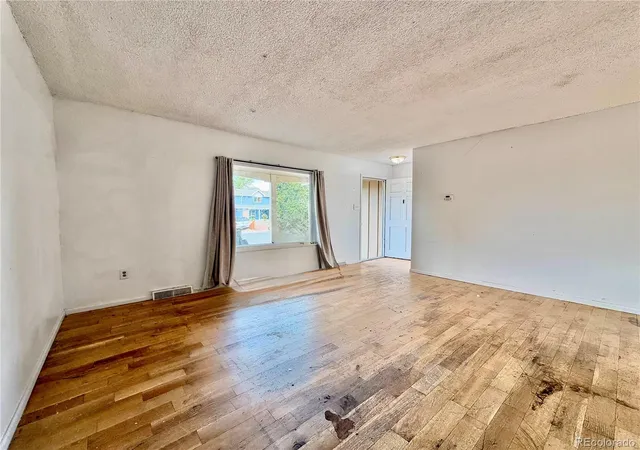 Photo 3 of Single family home for sale at 1996 S Olathe St, Aurora, CO 80013 | MLS# 7910848 | Listing updated on 2026-10-10