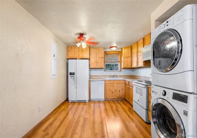 Photo 2 of Condo for sale at 7309 Bradburn Blvd #E, Westminster, CO 80030 | MLS# 2213230 | Listing updated on 2026-09-27