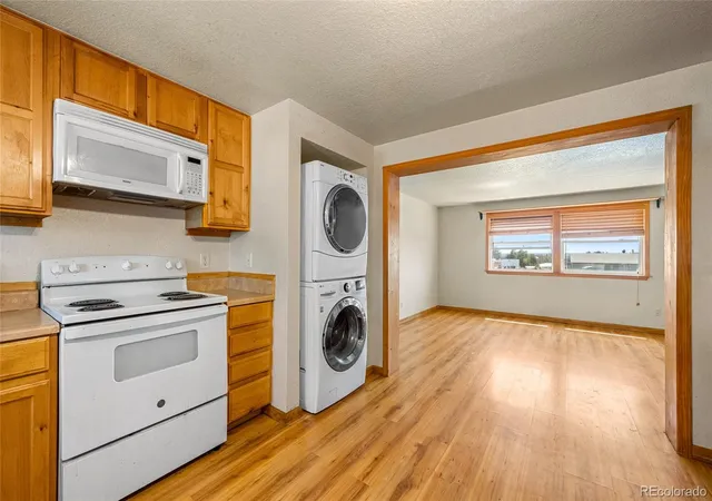 Photo 3 of Condo for sale at 7309 Bradburn Blvd #E, Westminster, CO 80030 | MLS# 2213230 | Listing updated on 2026-09-27
