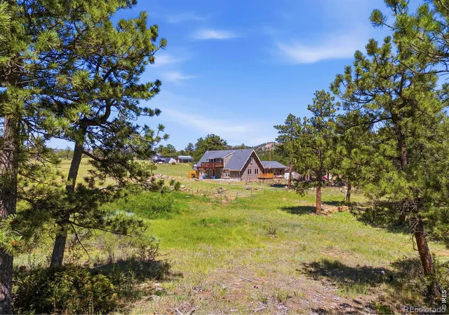Photo 3 of Single family home for sale at 100 S Cucharas Mountain Ct, Livermore, CO 80536 | MLS# IR1069496 | Listing updated on 2026-09-28