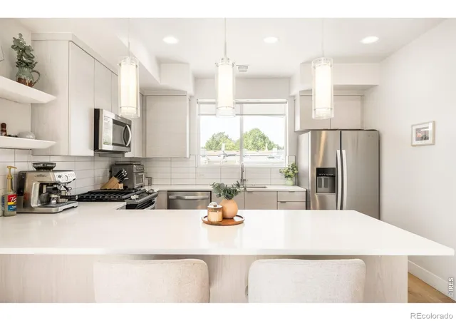 Photo 2 of Townhouse for sale at 3520 W Conejos Pl #14, Denver, CO 80204 | MLS# IR1069497 | Listing updated on 2026-10-07