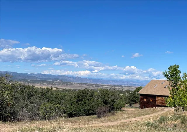 Photo 3 of Single family home for sale at 1551 Peak View Dr, Castle Rock, CO 80109 | MLS# 5022006 | Listing updated on 2026-10-09