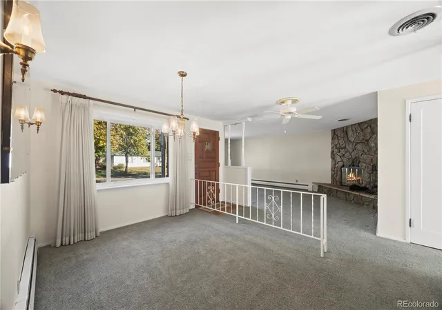 Photo 3 of Single family home for sale at 1043 Geneva St, Aurora, CO 80010 | MLS# 8037881 | Listing updated on 2026-10-08