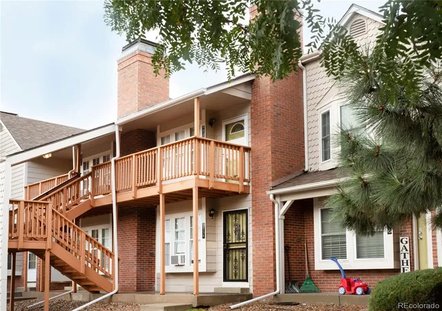 Photo 1 of Condo for sale at 9617 W Chatfield Ave #E, Littleton, CO 80128 | MLS# 6572454 | Listing updated on 2026-09-26