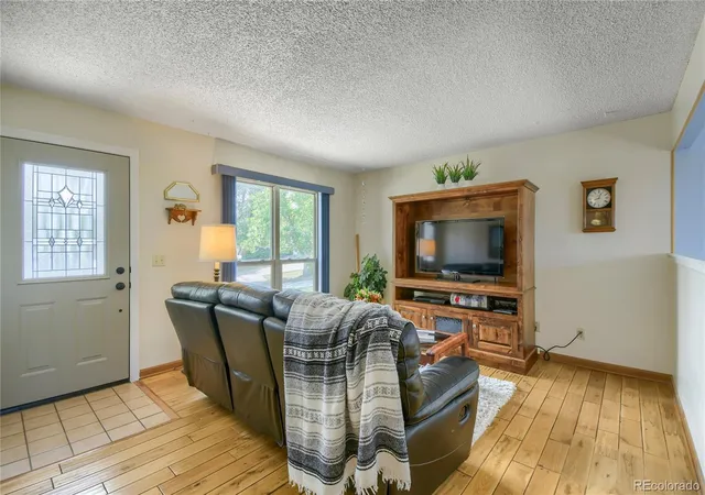 Photo 3 of Single family home for sale at 17411 E Gunnison Pl, Aurora, CO 80017 | MLS# 8308948 | Listing updated on 2026-09-26