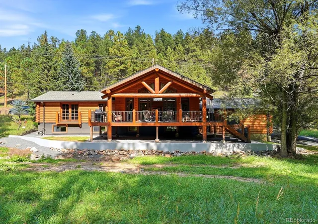Photo 1 of Single family home for sale at 27456 Troublesome Gulch Rd, Evergreen, CO 80439 | MLS# 5435675 | Listing updated on 2026-10-05