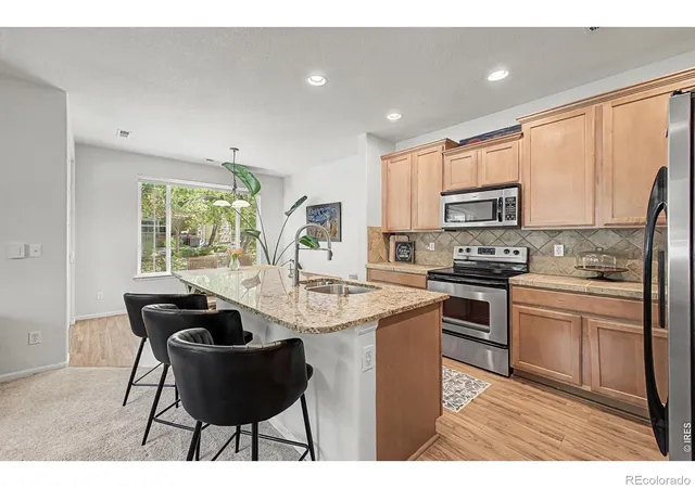 Photo 4 of Townhouse for sale at 11242 Osage Cir #A, Northglenn, CO 80234 | MLS# IR1069630 | Listing updated on 2026-09-29
