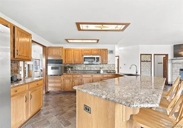 Photo 3 of Single family home for sale at 478 S Youngfield Ct, Lakewood, CO 80228 | MLS# 7771480 | Listing updated on 2026-09-29