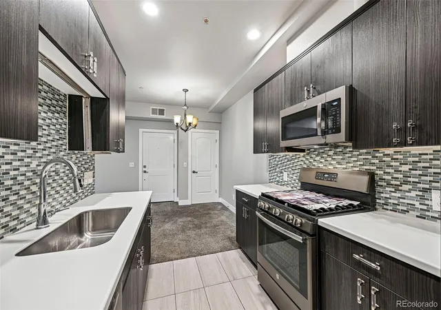 Photo 2 of Condo for sale at 1401 W 85th Avenue #C104, Denver, CO 80260 | MLS# 3296043 | Listing updated on 2026-10-09