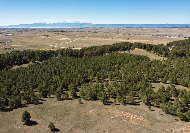 Photo 1 of Land for sale at 9040 Walker Rd, Colorado Springs, CO 80908 | MLS# 7721073 | Listing updated on 2026-10-07
