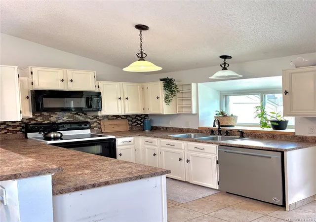 Listing Photo 5 - Condo for sale in building located at 9610 W Chatfield Ave, Littleton, CO 80128 - Unit #F