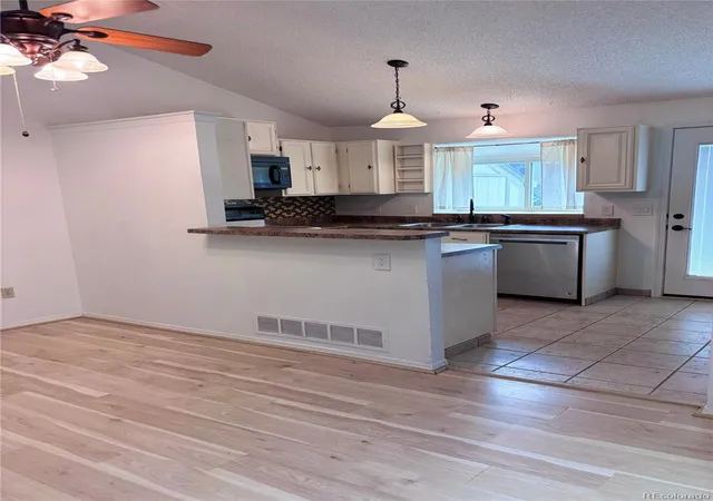 Photo 4 of Condo for sale at 9610 W Chatfield Ave #F, Littleton, CO 80128 | MLS# 5132813 | Listing updated on 2026-10-10