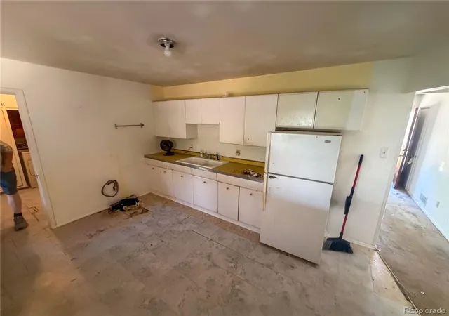 Photo 2 of Single family home for sale at 3323 S Grape St, Denver, CO 80222 | MLS# 2651836 | Listing updated on 2026-09-30