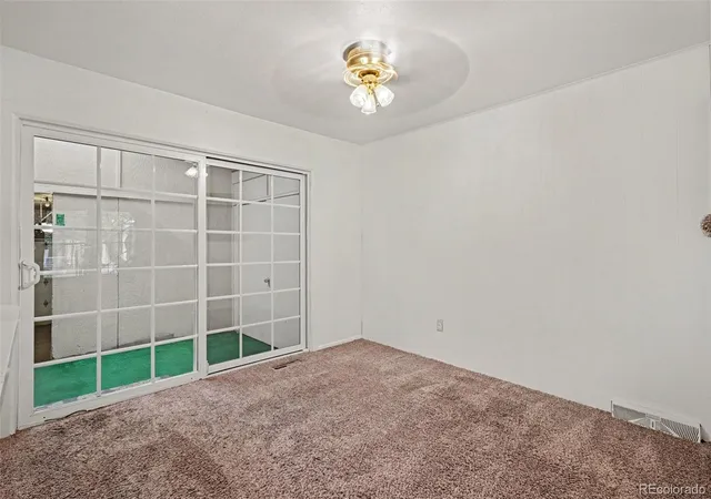 Photo 3 of Townhouse for sale at 11819 E Canal Dr, Aurora, CO 80011 | MLS# 6230443 | Listing updated on 2026-09-29