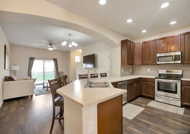 Photo 2 of Townhouse for sale at 9721 Dahlia Ln, Thornton, CO 80229 | MLS# 7694493 | Listing updated on 2026-10-08