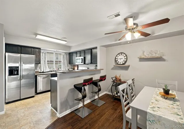 Listing Photo 1 - Condo for sale in building located at 8199 Welby Rd, Denver, CO 80229 - Unit #1102