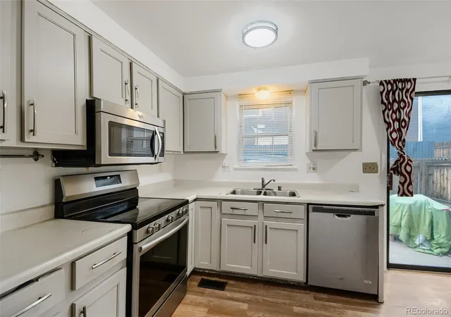 Photo 4 of Townhouse for sale at 1751 Norfolk St #B, Aurora, CO 80011 | MLS# 4628325 | Listing updated on 2026-10-07