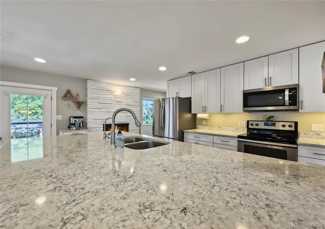 Single family home for sale at 4905 W Princeton Ave, Denver, CO 80236 | MLS# 5333994