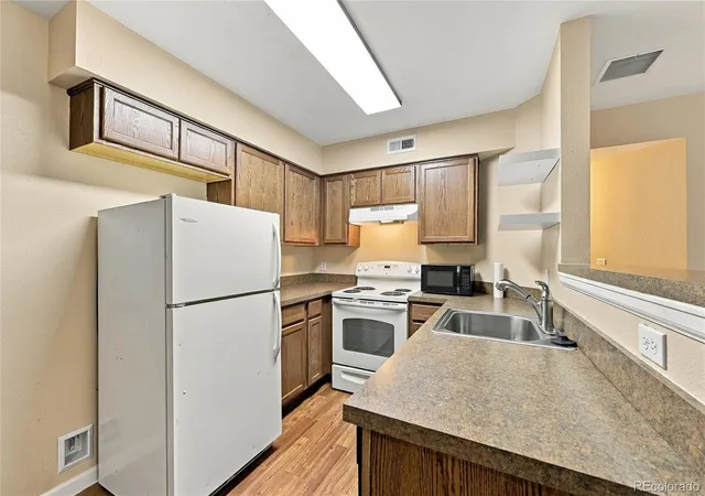 Photo 3 of Condo for sale at 8760 Corona St #101, Denver, CO 80229 | MLS# 2077824 | Listing updated on 2026-10-05