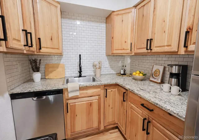 Photo 3 of Condo for sale at 9380 W 49th Avenue #107, Wheat Ridge, CO 80033 | MLS# 6592980 | Listing updated on 2026-10-03