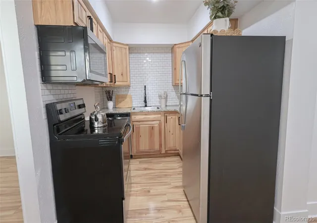 Listing Photo 4 - Condo for sale in building located at 9380 W 49th Ave, Wheat Ridge, CO 80033 - Unit #107