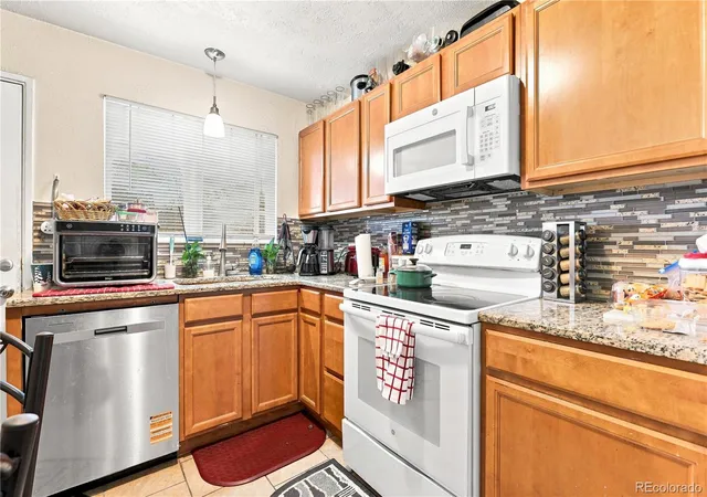 Photo 3 of Sale Pending at 3251 3263 Olive St, Denver, CO 80207 | MLS# 2104014 | Listing updated on 2026-10-08