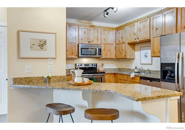 Listing Photo 1 - Condo for sale in building located at 2445 Windrow Dr, Fort Collins, CO 80525 - Unit #206