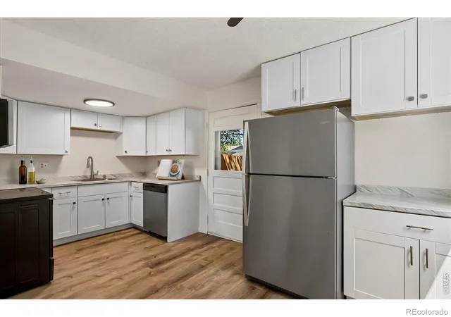 Photo 3 of Multi family home for sale at 5450 Alcott St, Denver, CO 80221 | MLS# IR1069895 | Listing updated on 2026-10-07