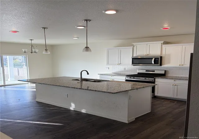 Photo 3 of Single family home for sale at 49 N Waterloo St, Aurora, CO 80018 | MLS# 2548611 | Listing updated on 2026-10-03