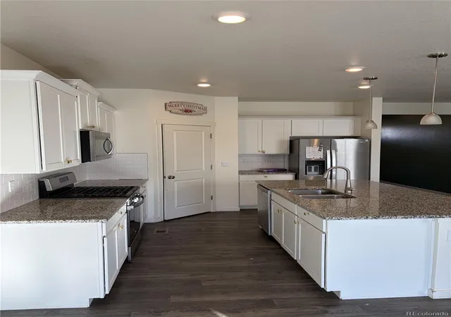 Photo 3 of Single family home for sale at 49 N Waterloo St, Aurora, CO 80018 | MLS# 2548611 | Listing updated on 2026-10-03