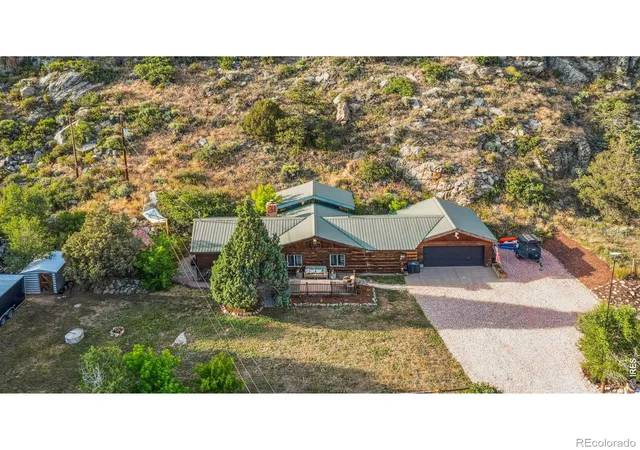 Photo 2 of Single family home for sale at 32224 Poudre Cyn Rd, Bellvue, CO 80512 | MLS# IR1069918 | Listing updated on 2026-10-02