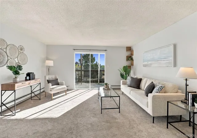 Photo 1 of Condo for sale at 6940 E Girard Ave #410, Denver, CO 80224 | MLS# 5990261 | Listing updated on 2026-10-09