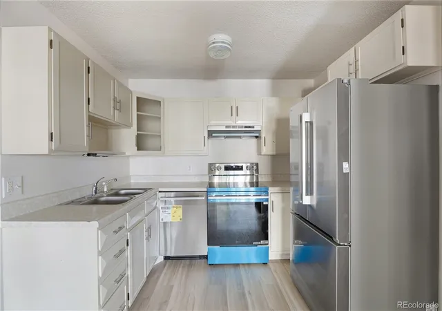 Photo 3 of Condo for sale at 9315 E Center Ave #1B, Denver, CO 80247 | MLS# 6978179 | Listing updated on 2026-10-06