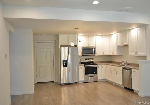 Photo 1 of Townhouse for sale at 9041 E 58th Avenue, Denver, CO 80238 | MLS# 2526058 | Listing updated on 2026-10-05