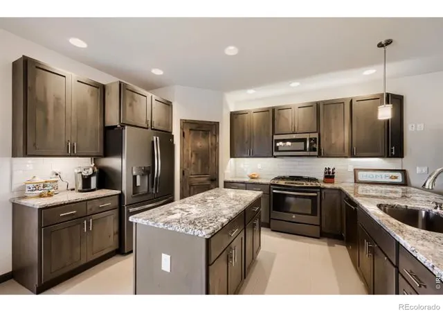 Photo 3 of Townhouse for sale at 820 13th Street, Berthoud, CO 80513 | MLS# IR1070017 | Listing updated on 2026-10-06